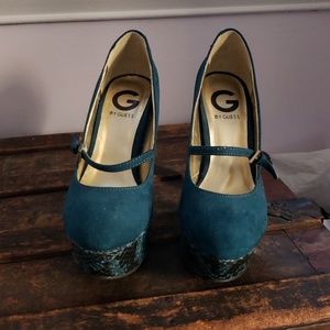 Teal velvet heels with teal snakeskin base